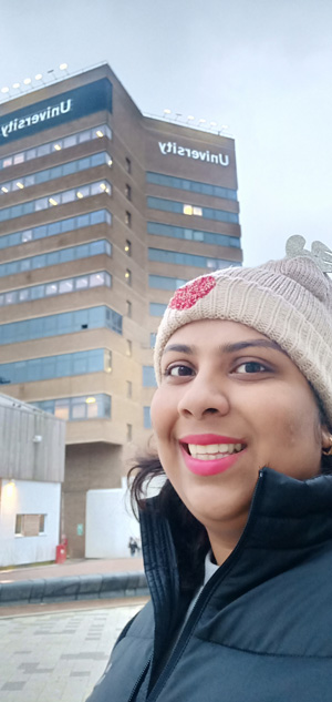 A selfie of Neha on the University of huddersfield campus