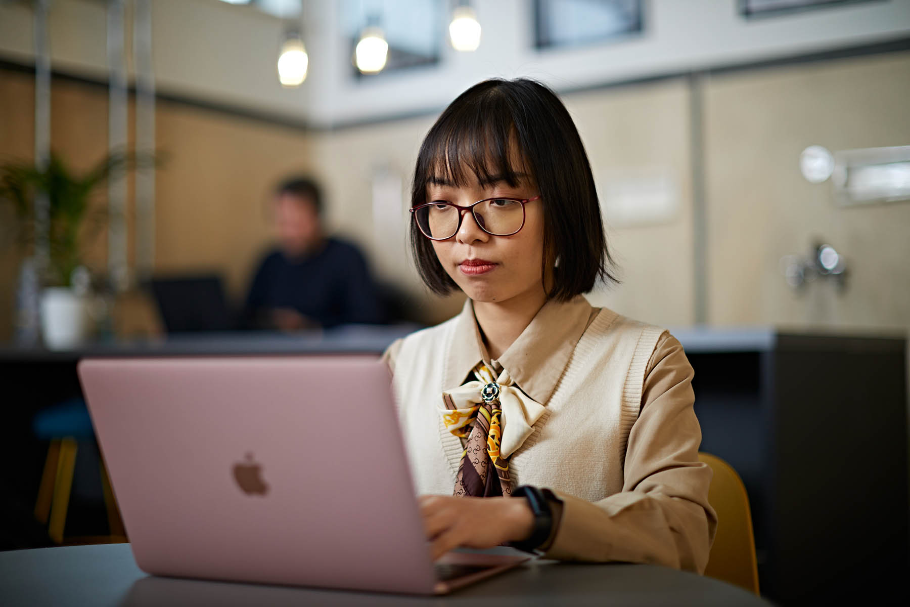 A student studying at work.