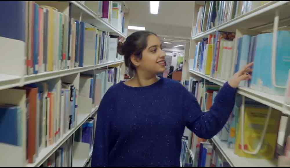 Student in library