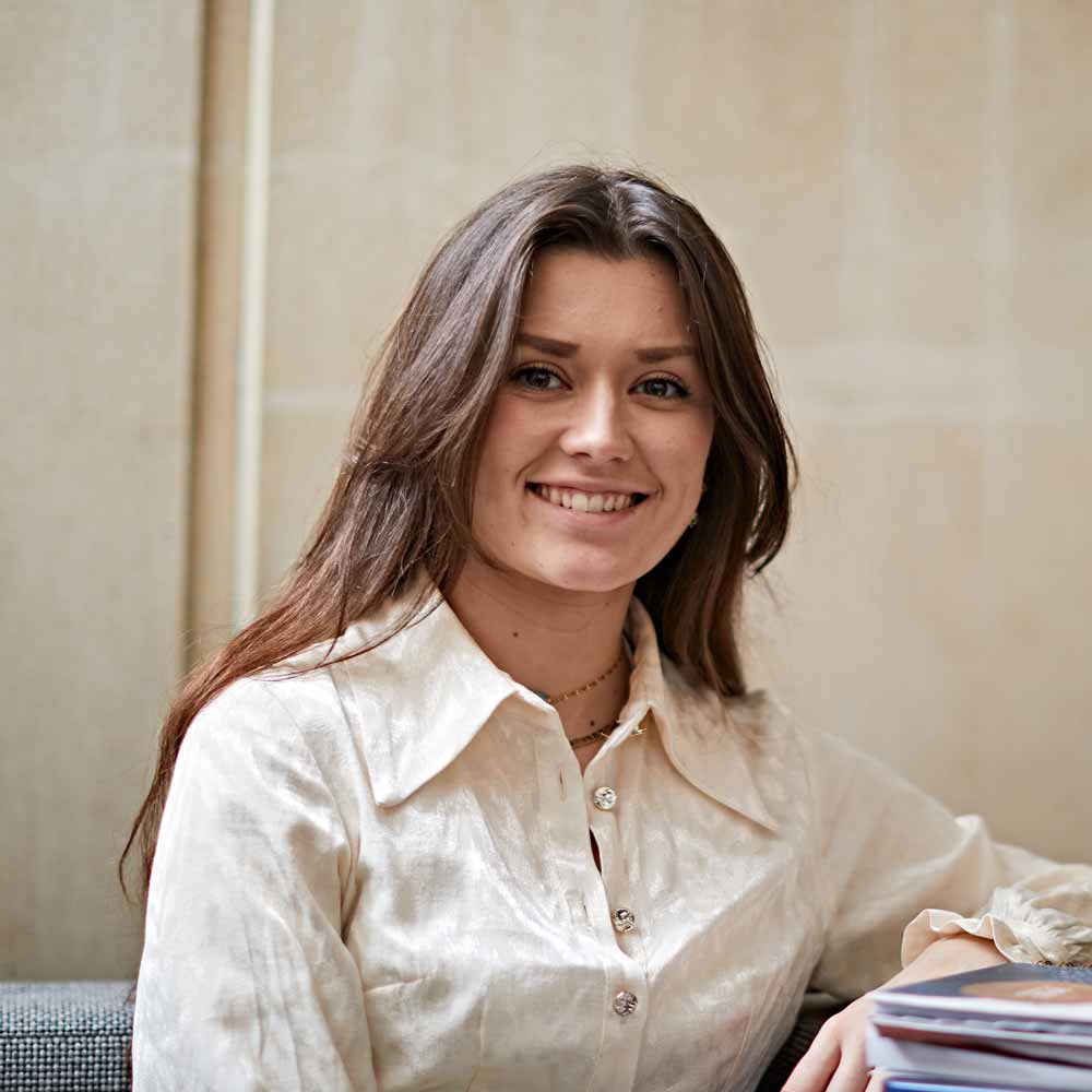 a photo of emily smiling at the camera