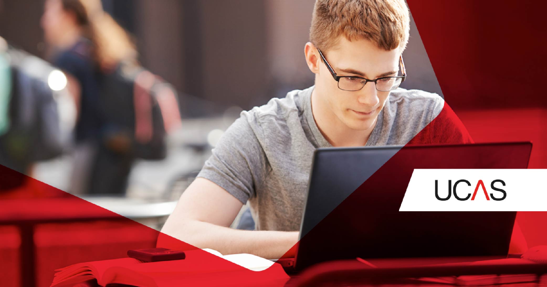 A banner with the UCAS logo and a man looking at his laptop