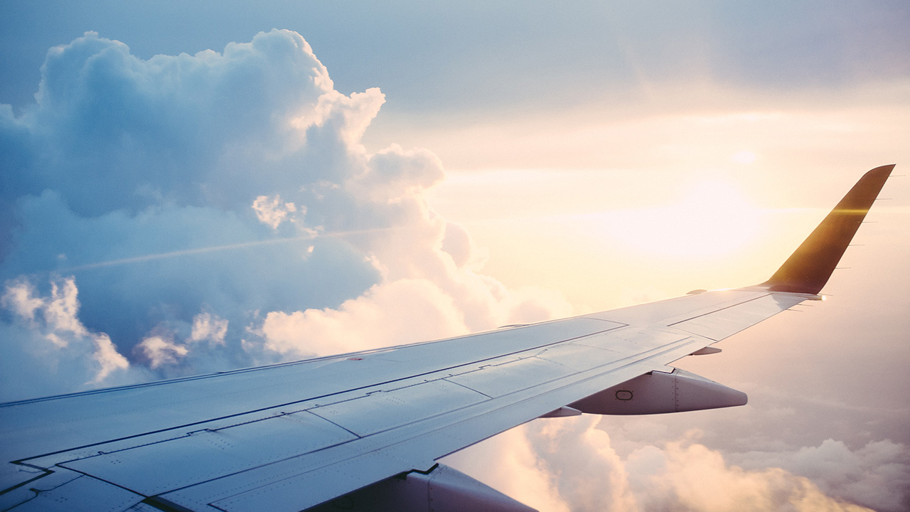 aerial photography of airliner, photo by Ross Parmly on Unsplash