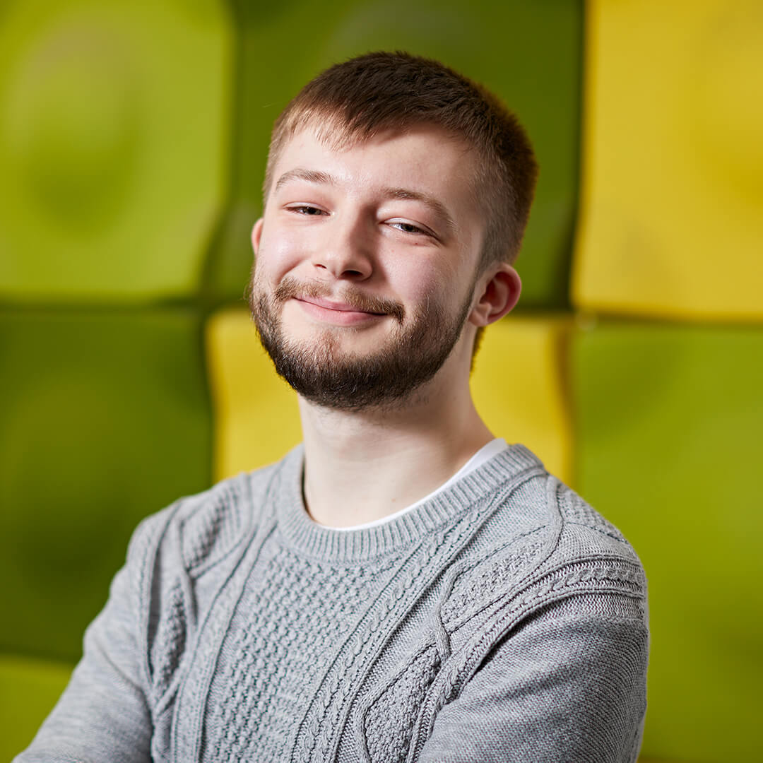 Software engineering student James smiling towards camera