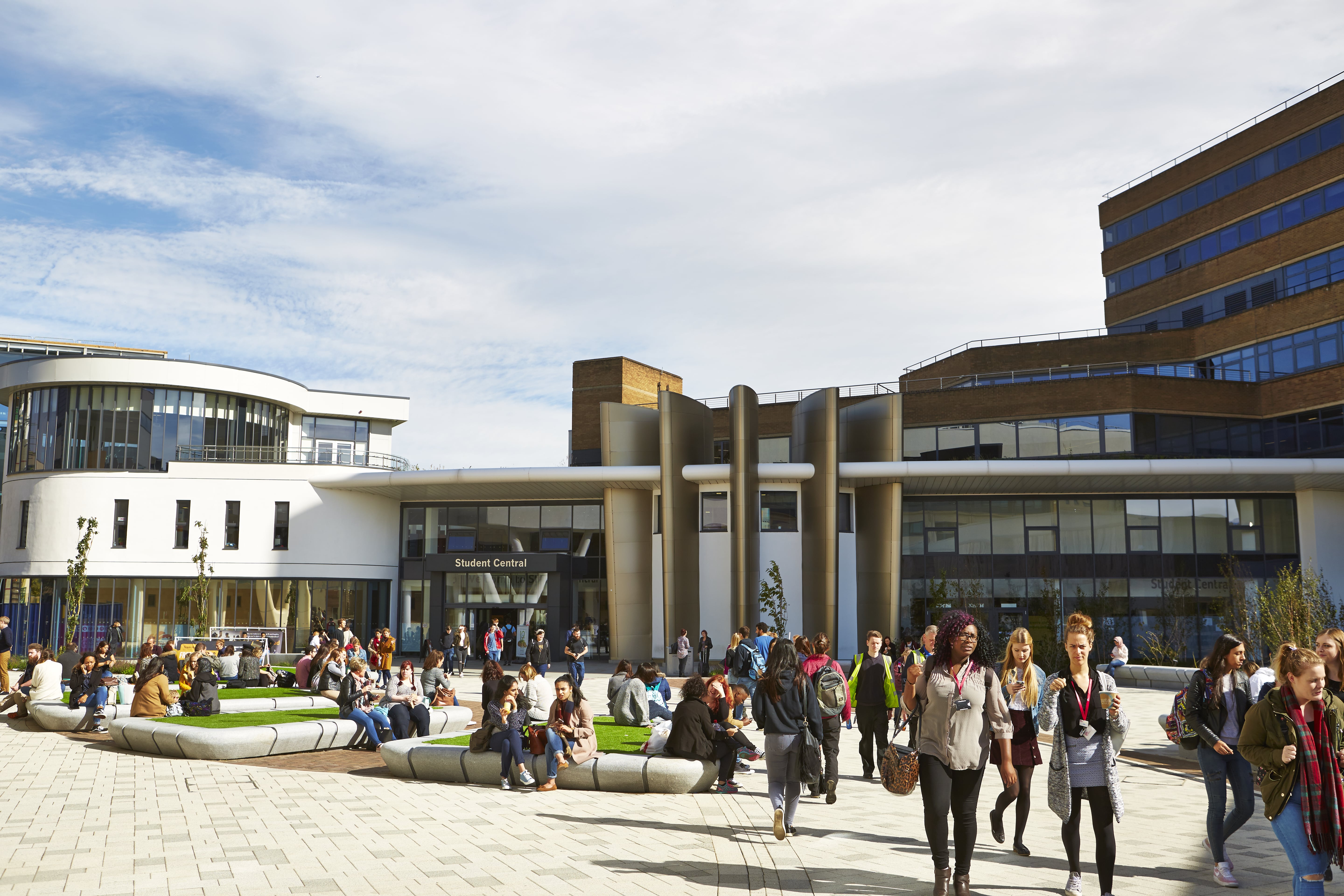 A view of student central on a hot summers day overlooking the plaza outside it.