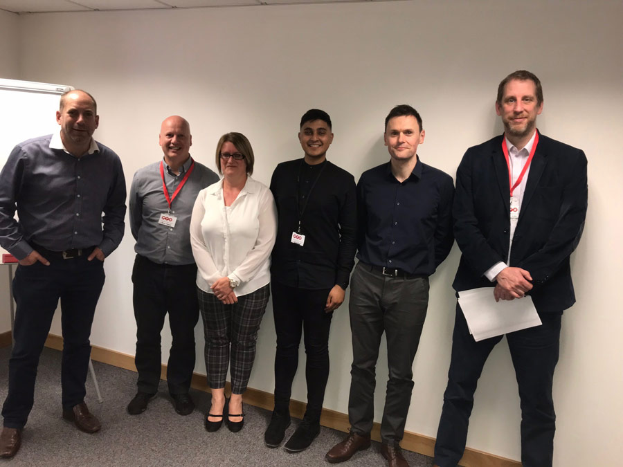 A photo of Anasur Rahman with a group of people.