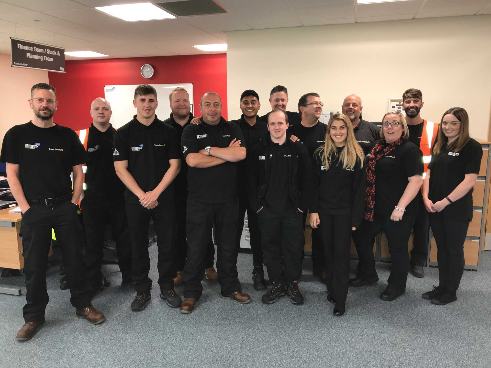 A group photo of the Travis Perkins Finance team and Stock and planning Team.