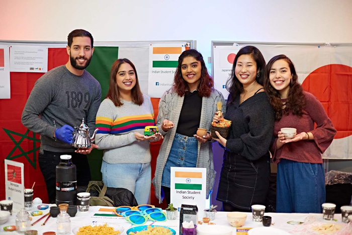 A group photo of students from different global societies.