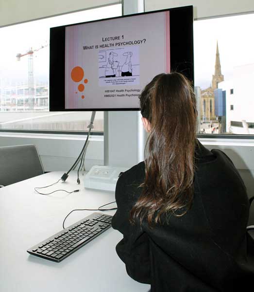 Student Working a psychology project on a computer