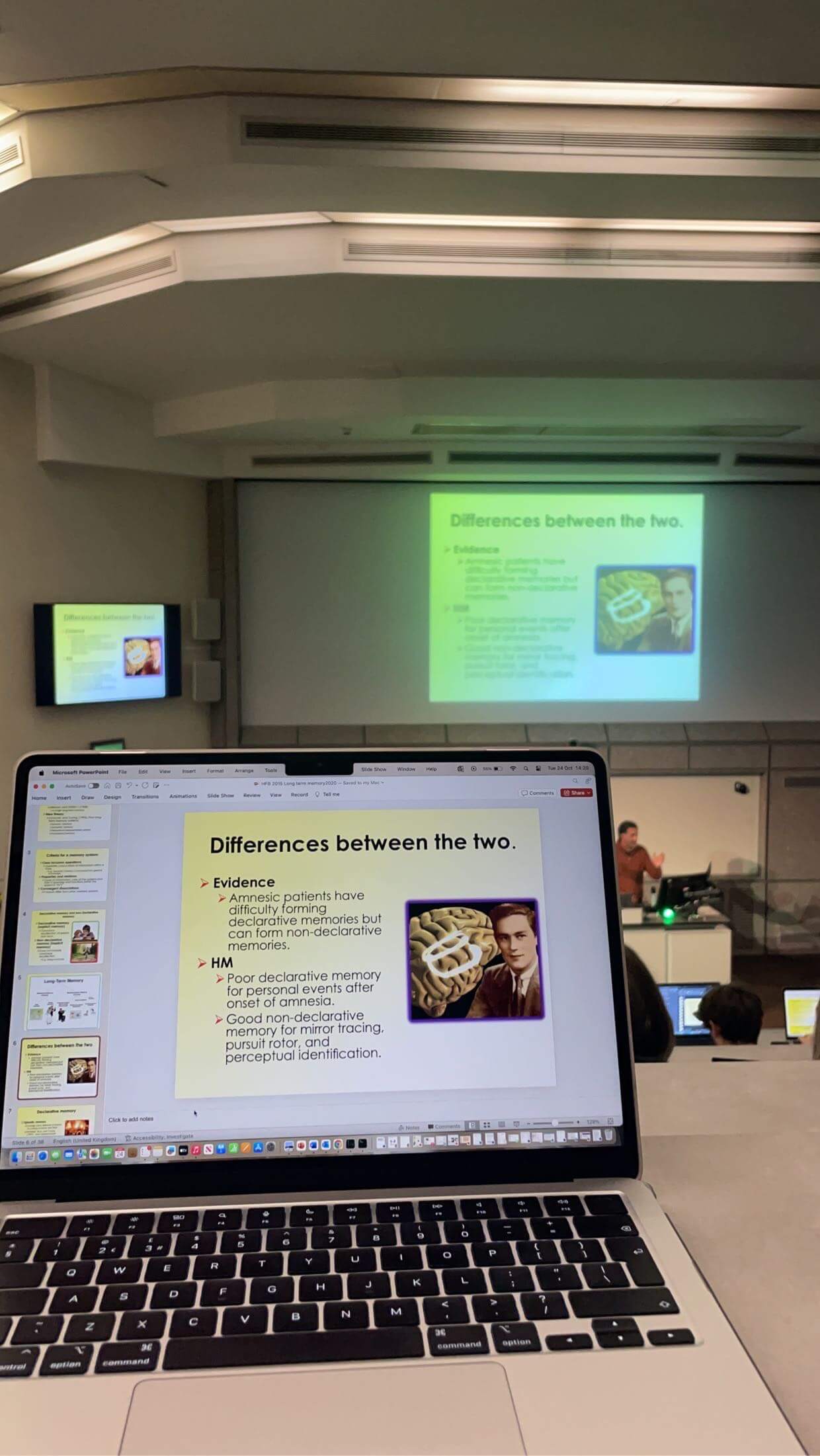 Ayushi's laptop in lectures taking notes with powerpoint open