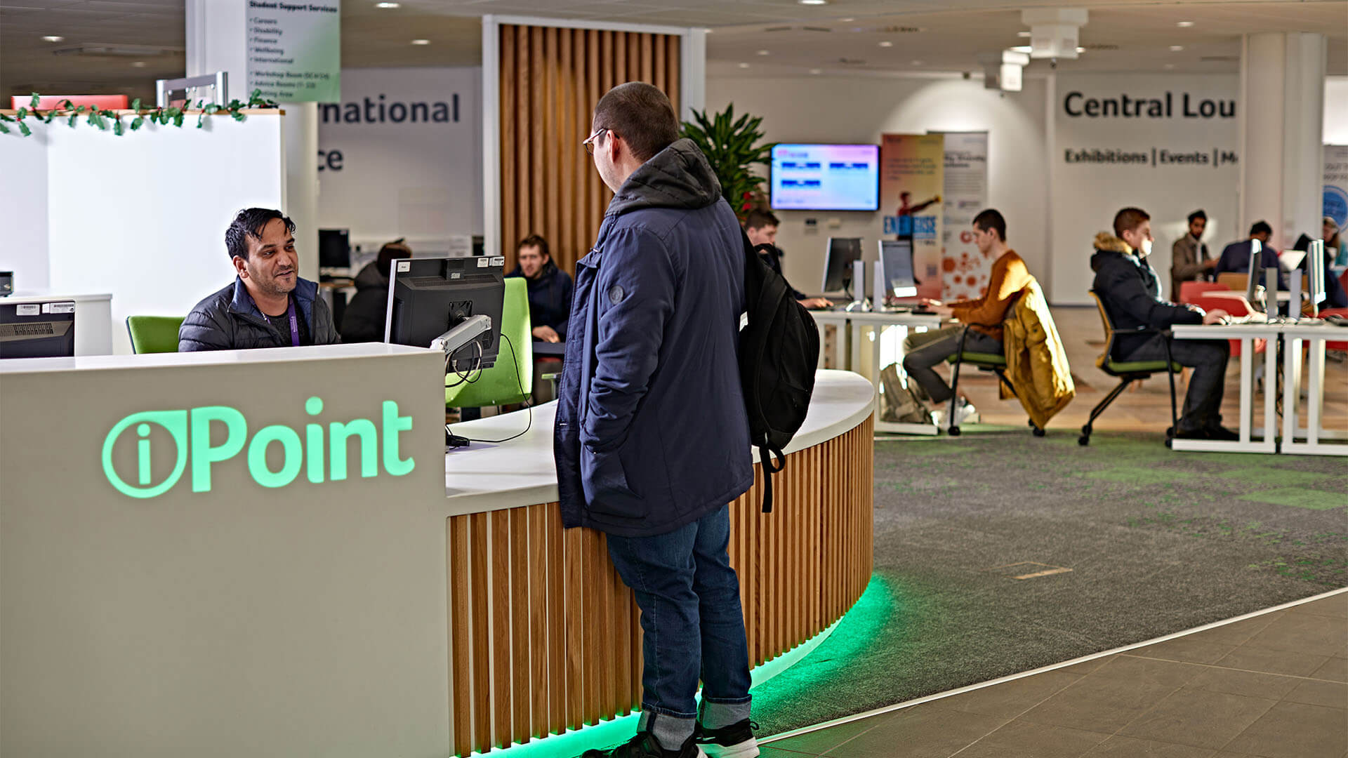 Student accesses disability support from the iPoint desk in student central