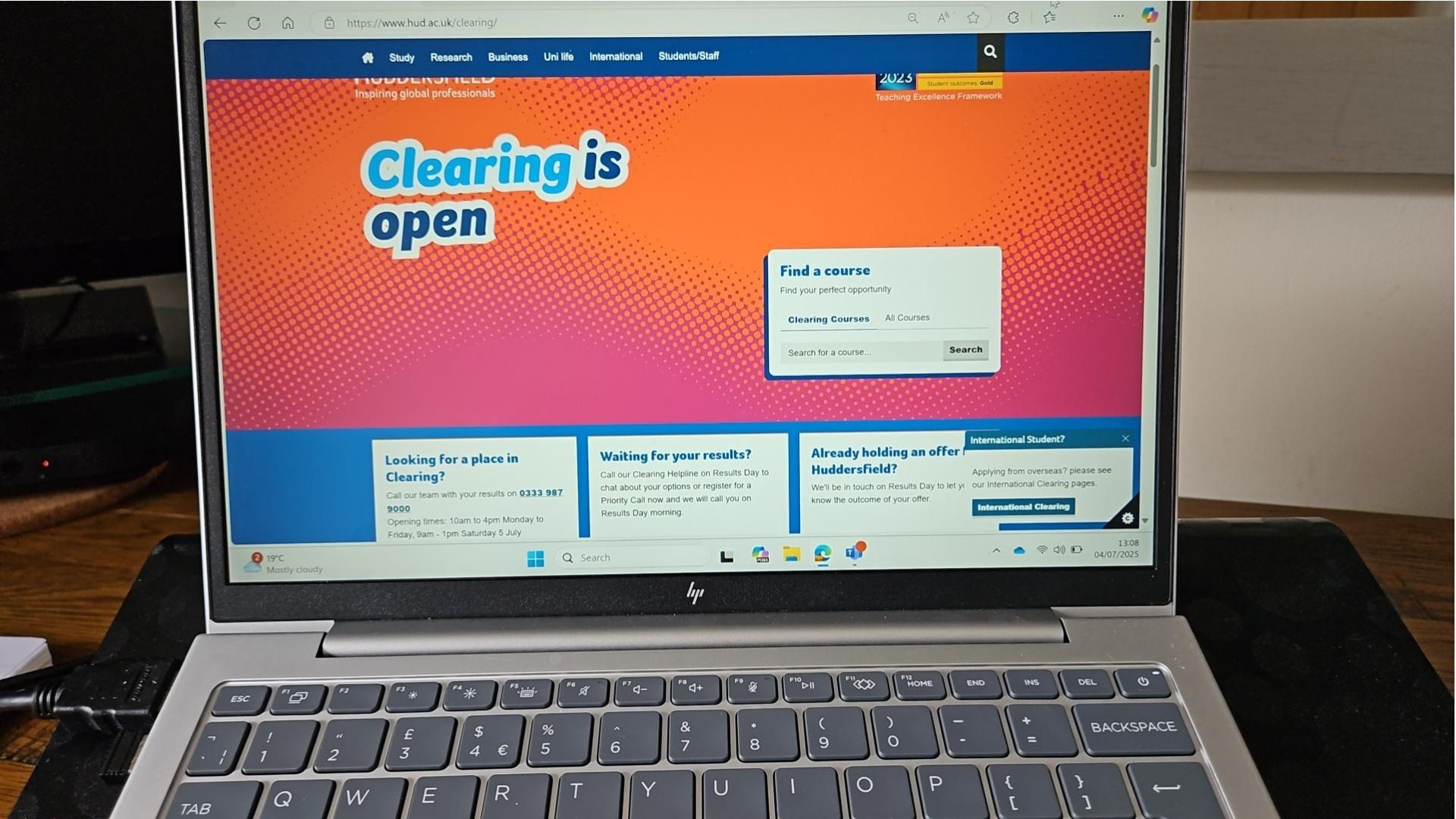 A laptop with the University of Huddersfield's Clearing website open