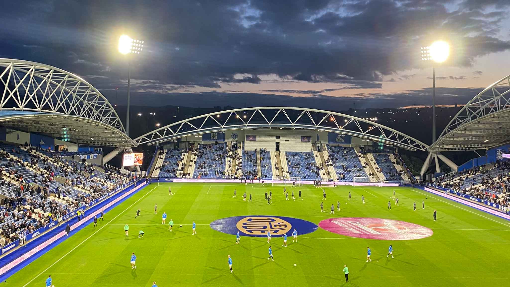 A view of a football stadium at night