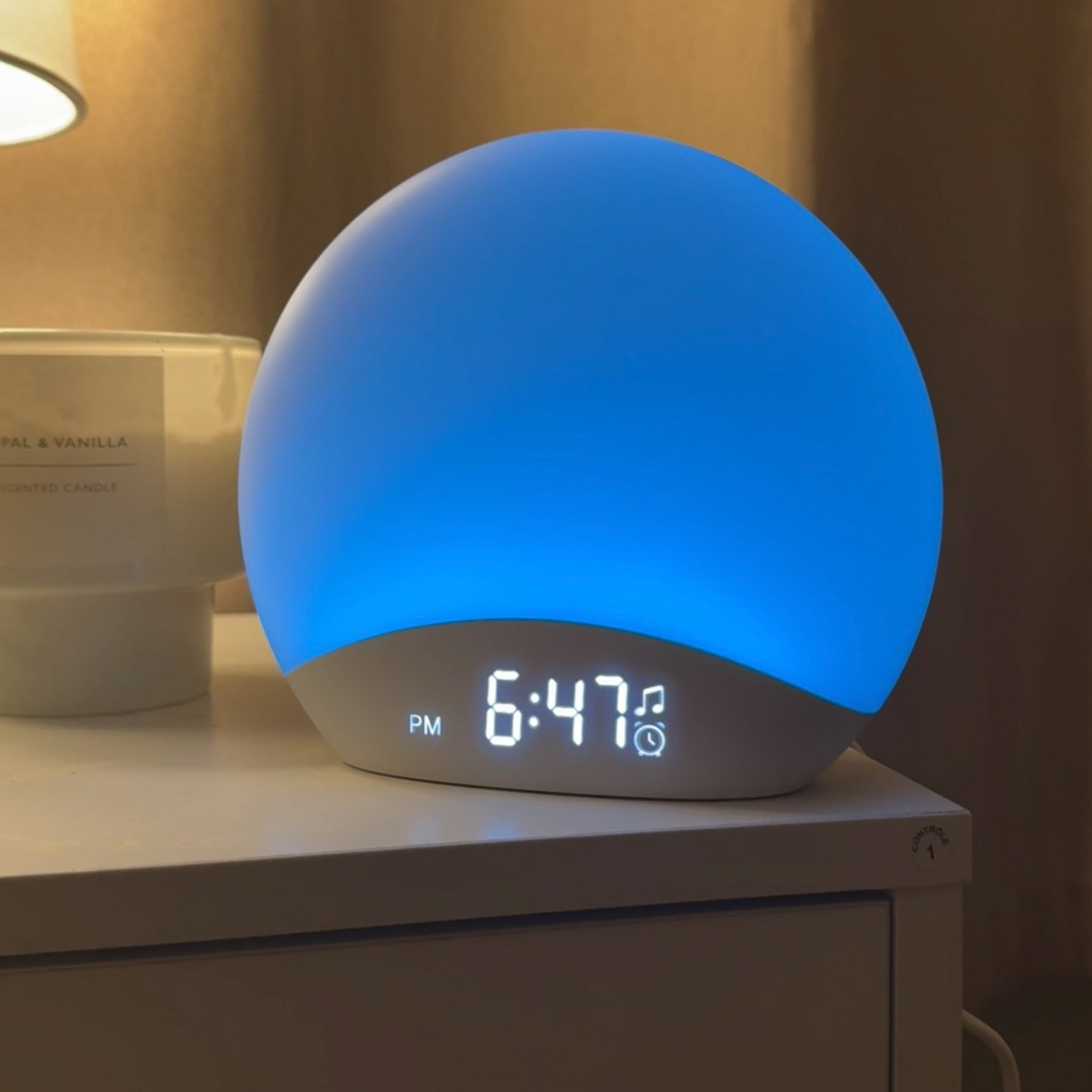 A blue alarm clock