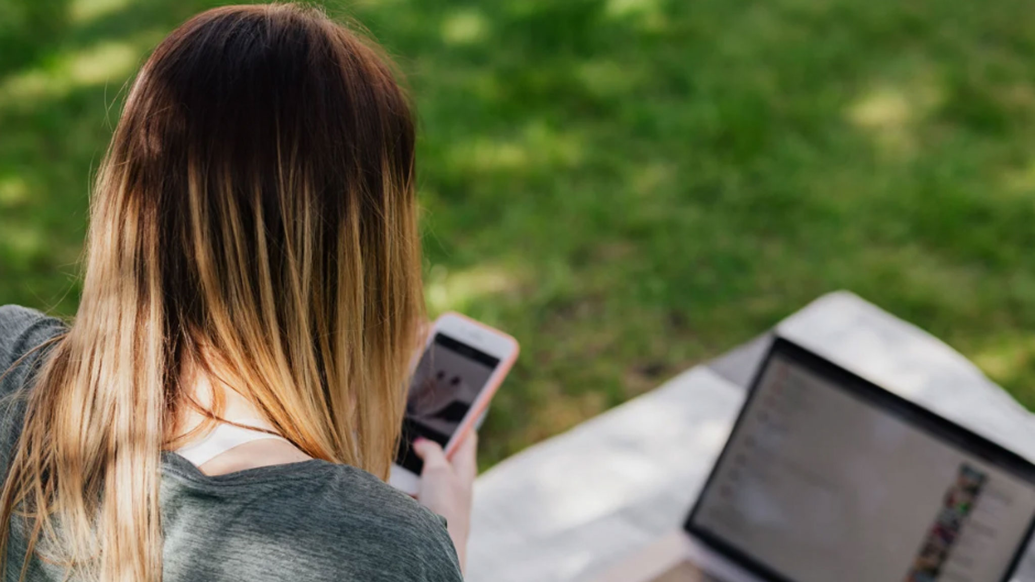 A person looking at a mobile phone