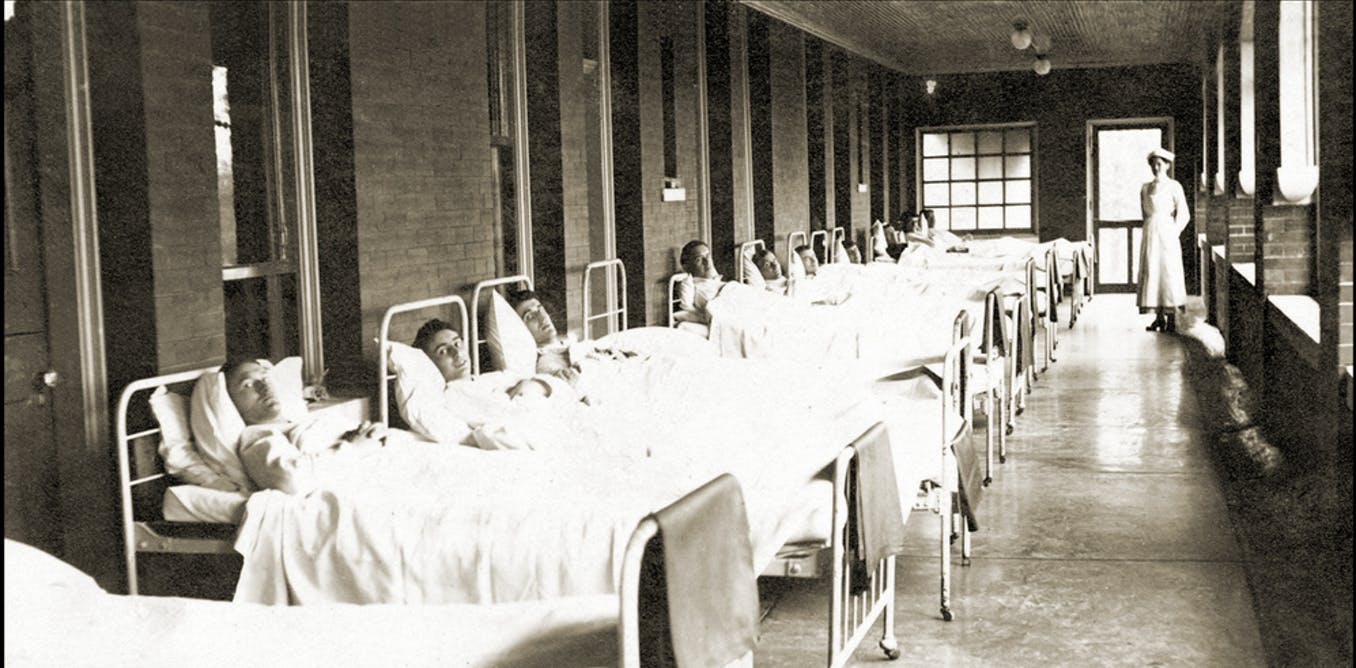 black and white photo of a hospital ward in the First World War