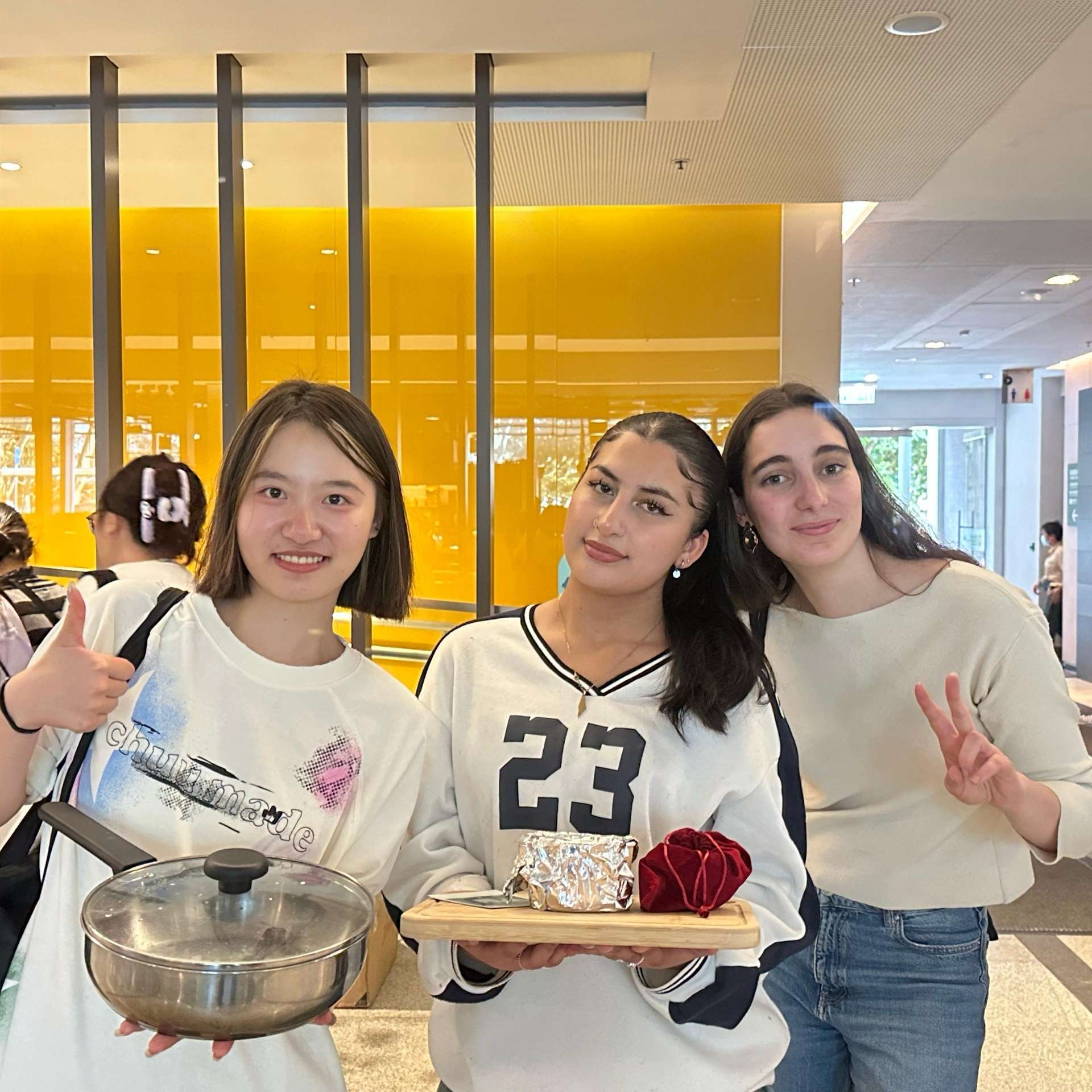 Photograph of three exchange students during the welcome events at the Hang Seng University of Hong Kong