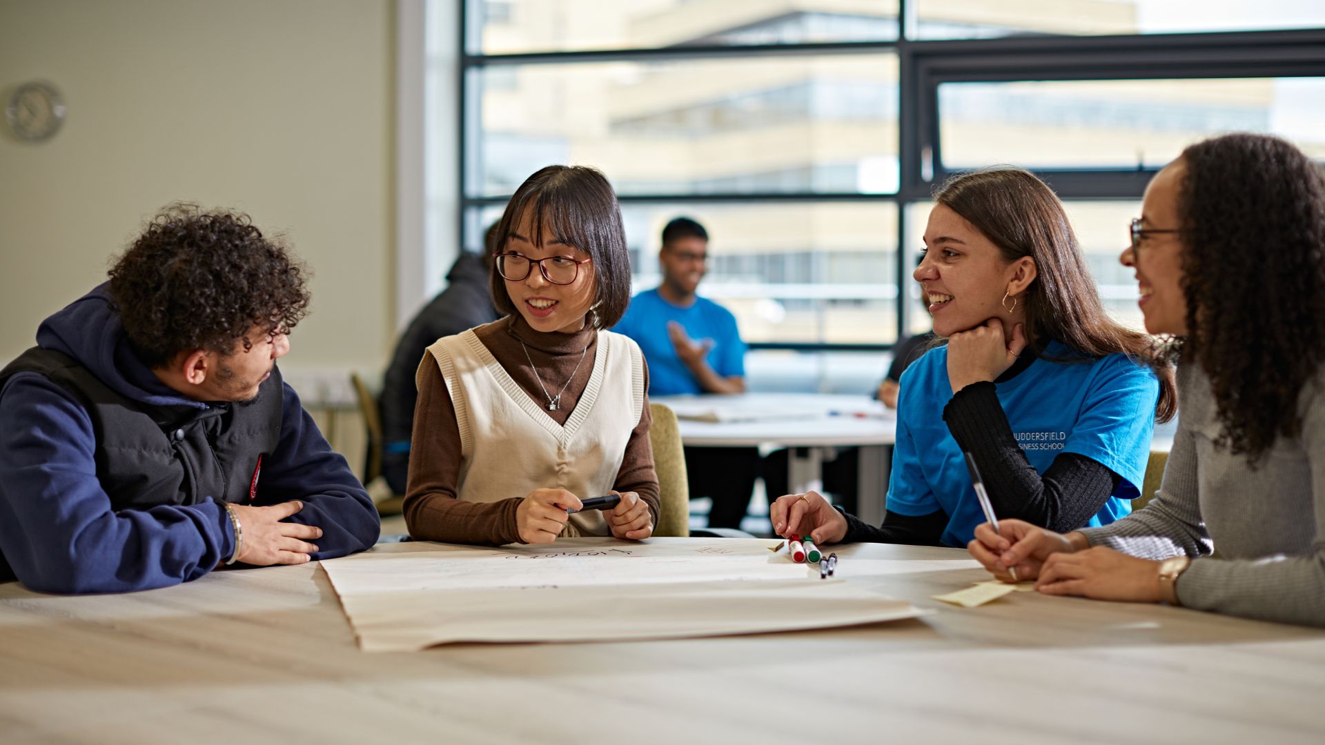 Students working in the Executive Suite in the Business School