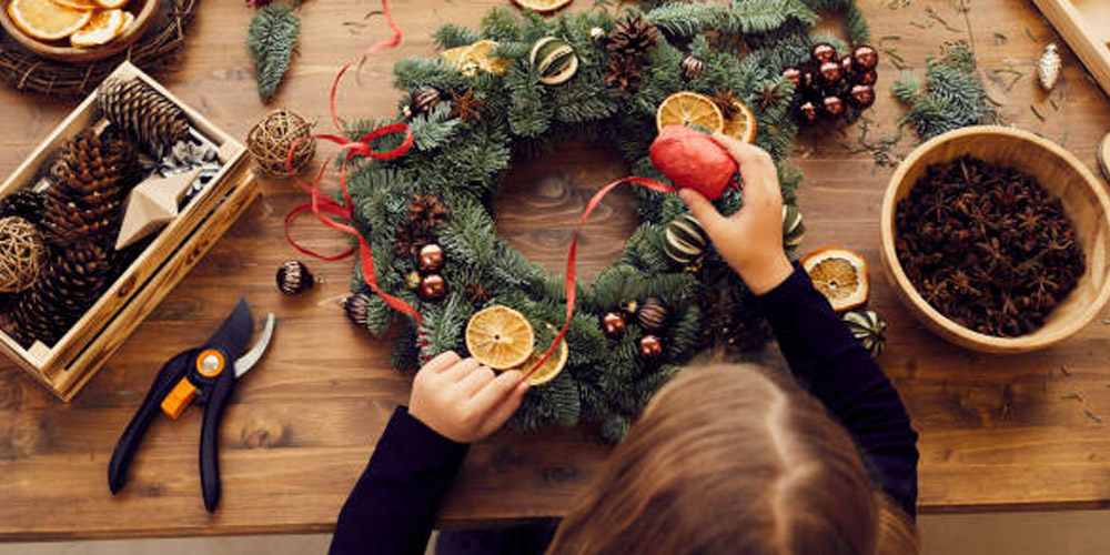 A girl making a wreath