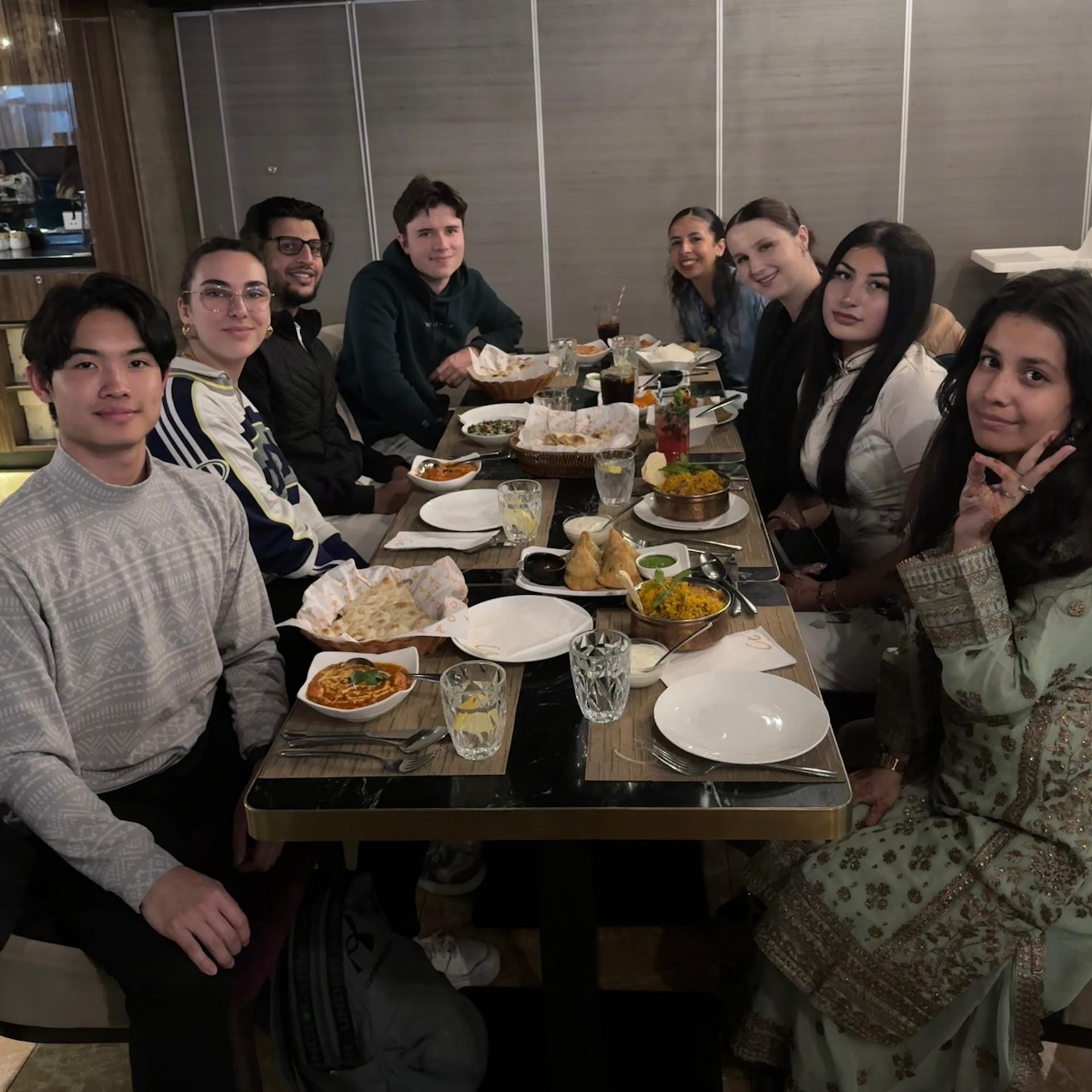 Photograph of exchange students in Hong Kong having a meal