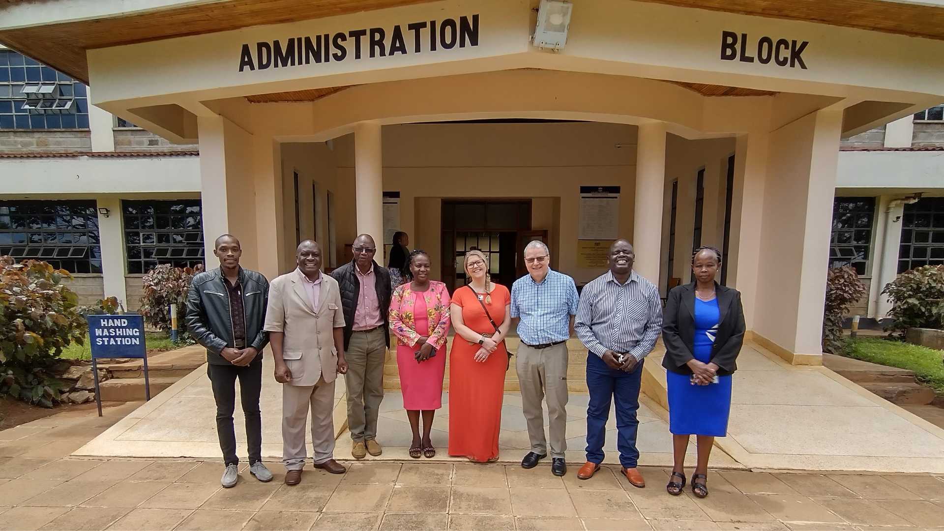 The AAKTP Team, including experts form the University of Huddersfield, Kibabii University, and Carbon Footprint Ltd. standing in front of Kibabii University.