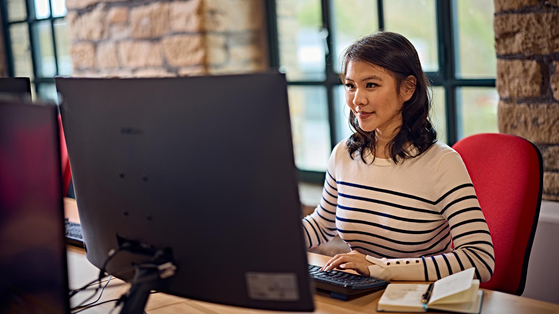 A person working at a computer.