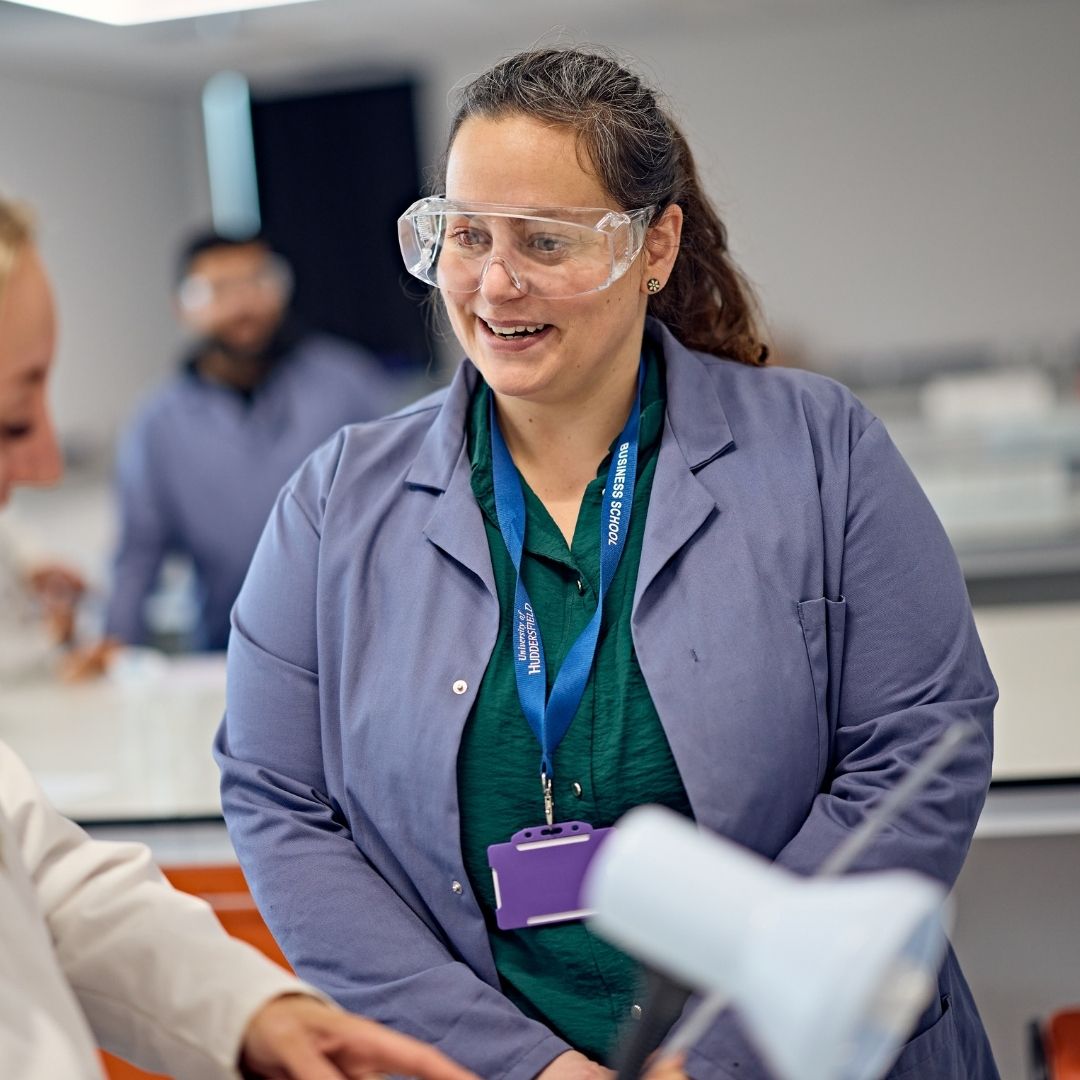 Hannah with goggles on in Science lab