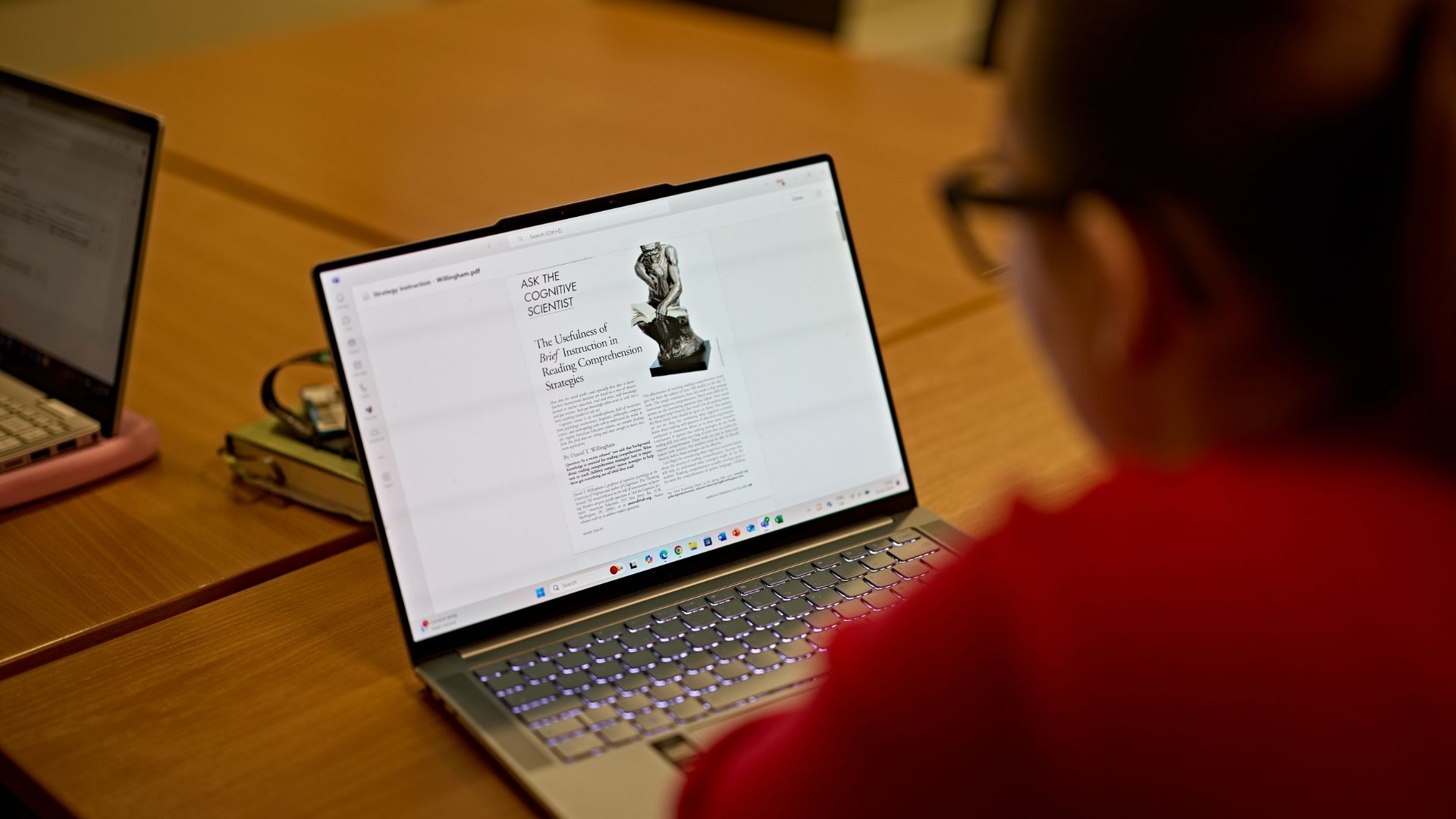 Student working on laptop - over the shoulder shot