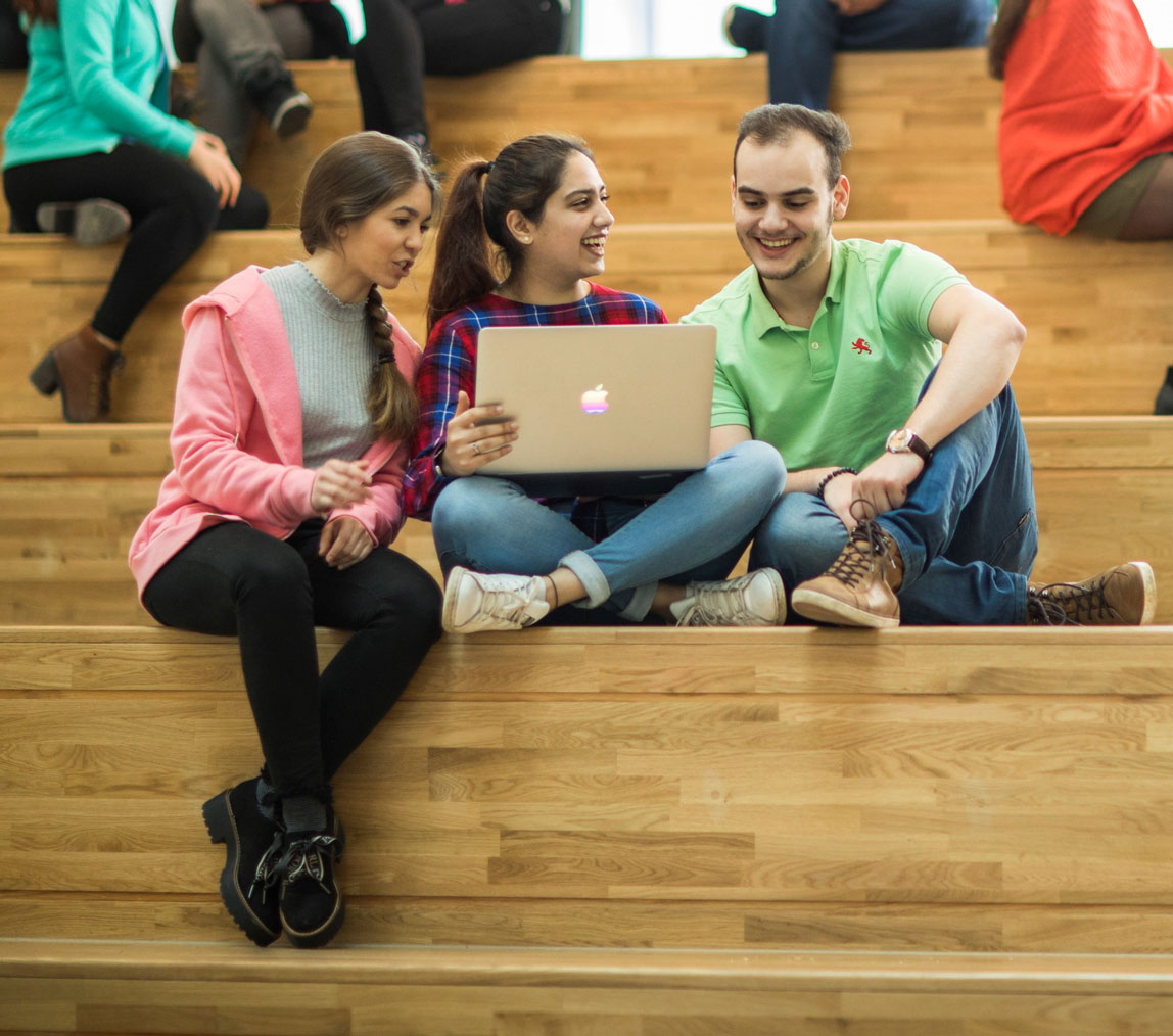 postgraduate students with laptop