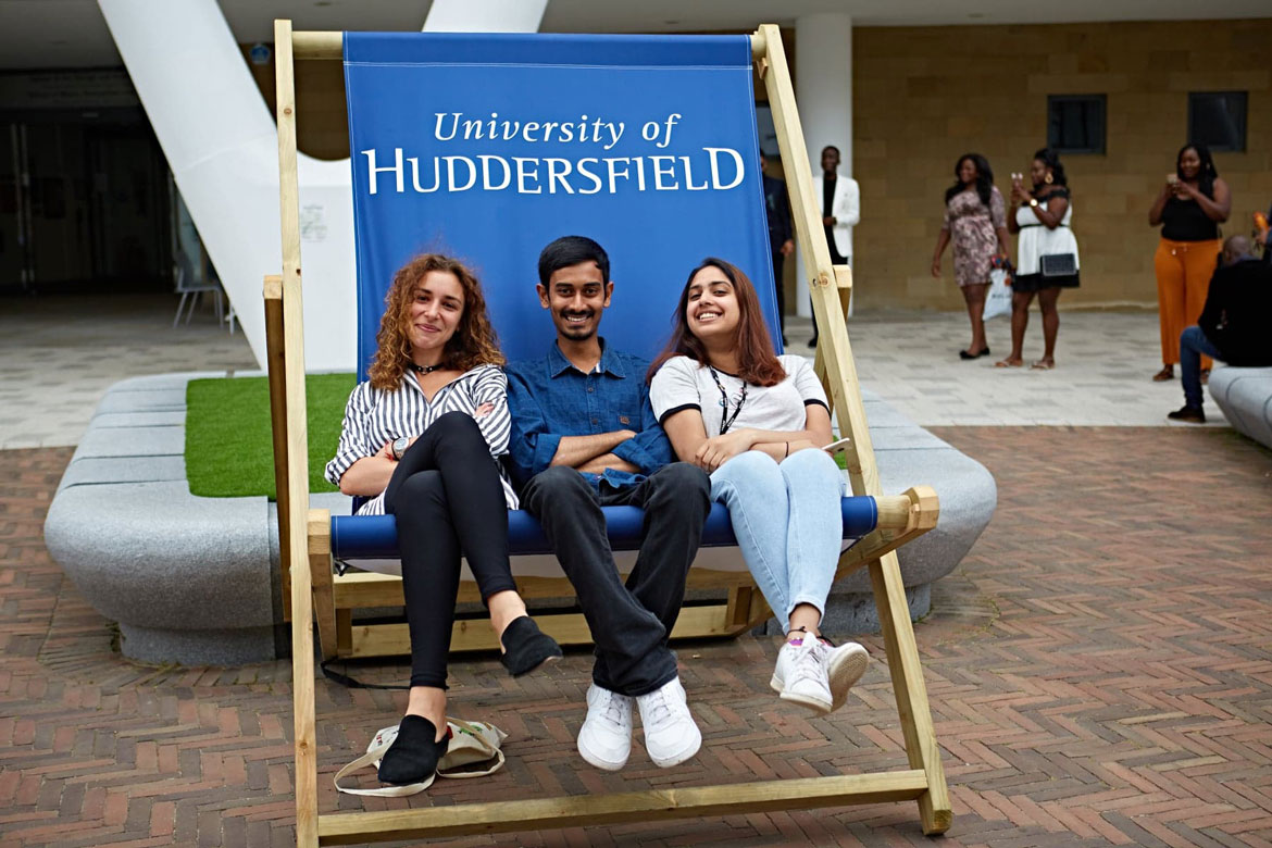 postgraduate students on deckchair